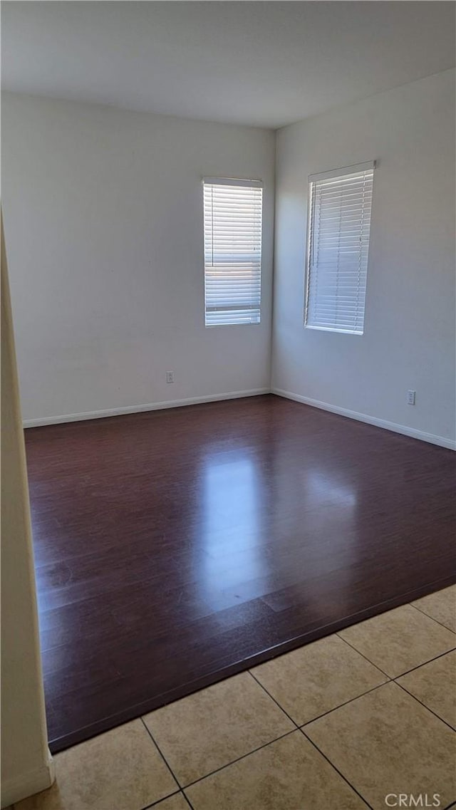 29746 Maxmillian Ave, Murrieta, CA 92563 - unfurnished room featuring wood finished floors and baseboards