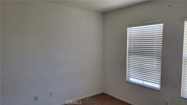 29746 Maxmillian Ave, Murrieta, CA 92563 - empty room with carpet and baseboards