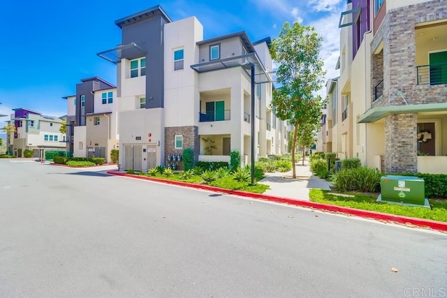 2140 Stellar Way Unit 4, Chula Vista, CA 91915 - view of asphalt street featuring a residential view and curbs