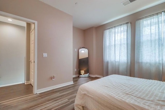 2140 Stellar Way Unit 4, Chula Vista, CA 91915 - bedroom featuring wood finished floors and baseboards