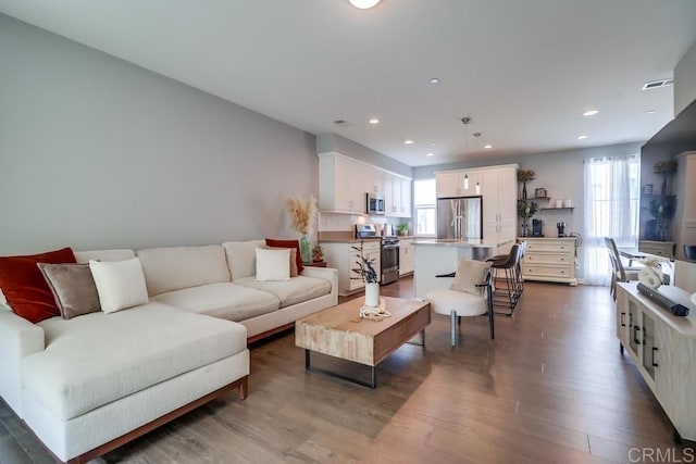 2140 Stellar Way Unit 4, Chula Vista, CA 91915 - living area featuring wood finished floors and recessed lighting