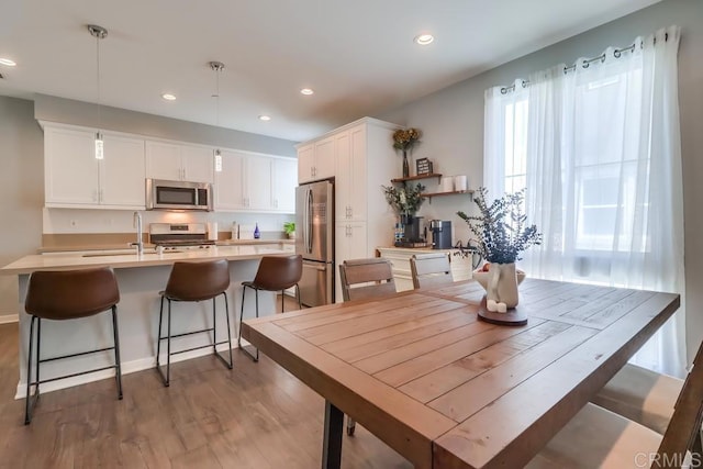 2140 Stellar Way Unit 4, Chula Vista, CA 91915 - dining space featuring recessed lighting and wood finished floors