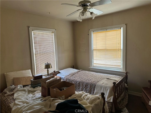 7423 Indiana Ave, Riverside, CA 92504 - bedroom featuring a ceiling fan and baseboards