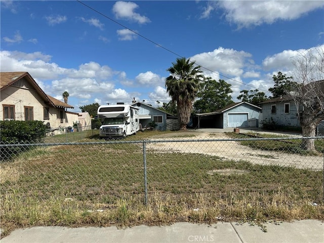 7423 Indiana Ave, Riverside, CA 92504 - view of front of house featuring a detached garage and driveway