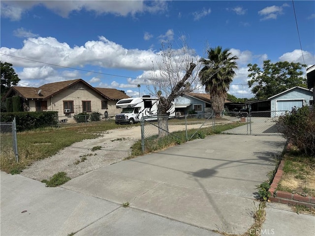 7423 Indiana Ave, Riverside, CA 92504 - view of concrete surface with a gated entry and a gate