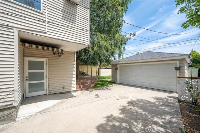 850 N Naomi St, Burbank, CA 91505 - view of side of home featuring an outdoor structure and a detached garage