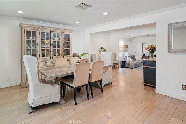 850 N Naomi St, Burbank, CA 91505 - dining room featuring crown molding, light wood finished floors, and recessed lighting