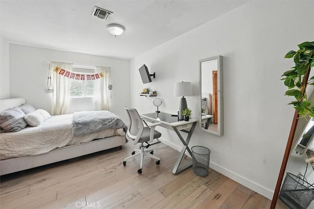 850 N Naomi St, Burbank, CA 91505 - bedroom featuring wood finished floors and a desk