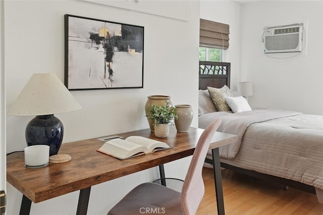 850 N Naomi St, Burbank, CA 91505 - bedroom featuring an AC wall unit and wood finished floors