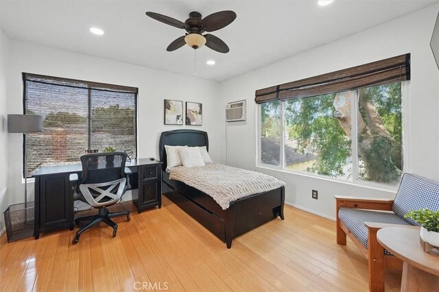 850 N Naomi St, Burbank, CA 91505 - bedroom featuring a desk, a wall unit AC, light wood-style floors, recessed lighting, and ceiling fan