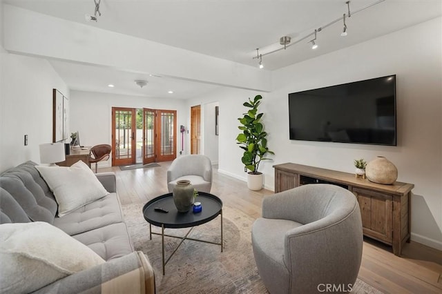850 N Naomi St, Burbank, CA 91505 - living area with light wood-type flooring, rail lighting, french doors, and recessed lighting