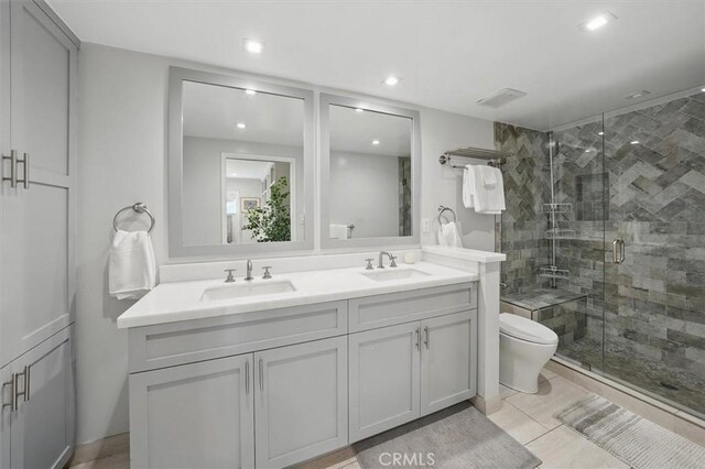 850 N Naomi St, Burbank, CA 91505 - bathroom featuring double vanity, a shower stall, and recessed lighting