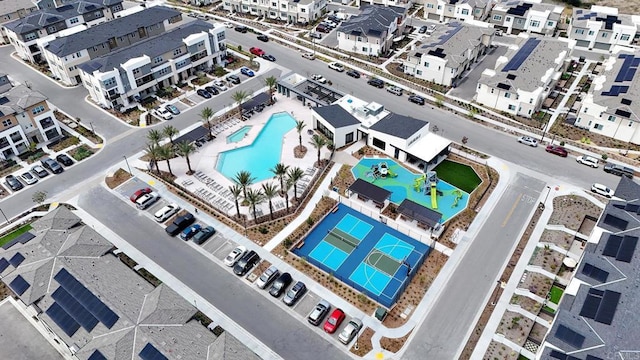 drone / aerial view of a pool