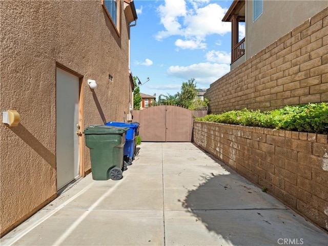 30375 June Rose Ct, Castaic, CA 91384 - view of side of property with a gate and stucco siding