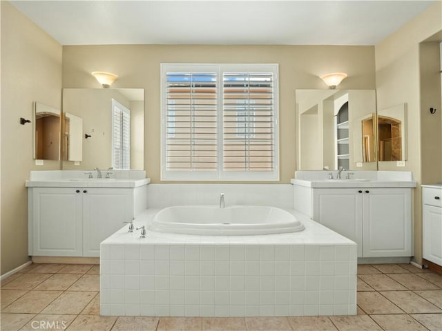 30375 June Rose Ct, Castaic, CA 91384 - bathroom featuring tile patterned floors, a garden tub, and two vanities