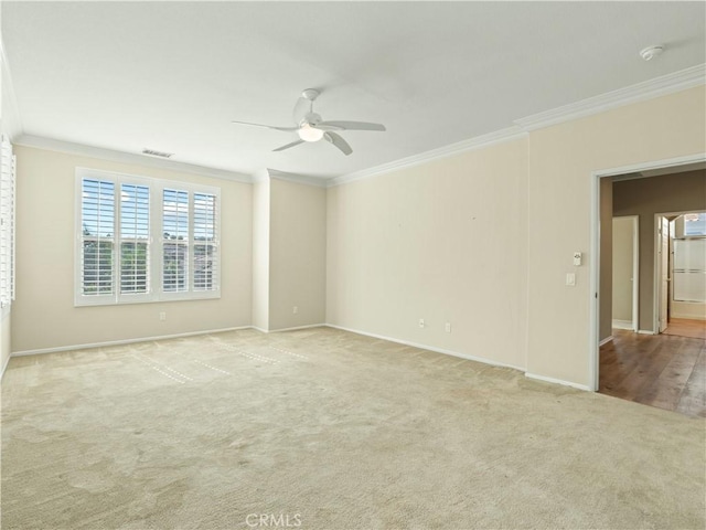 30375 June Rose Ct, Castaic, CA 91384 - carpeted empty room with crown molding, ceiling fan, baseboards, and a smoke detector
