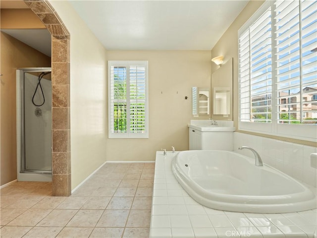30375 June Rose Ct, Castaic, CA 91384 - full bath with vanity, a bath, a stall shower, and tile patterned flooring