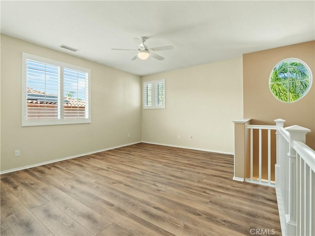 30375 June Rose Ct, Castaic, CA 91384 - spare room featuring ceiling fan, wood finished floors, and baseboards