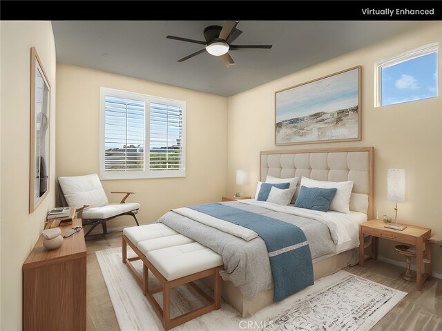 30375 June Rose Ct, Castaic, CA 91384 - bedroom with light wood-style floors and ceiling fan