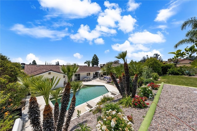 outdoor pool with a patio