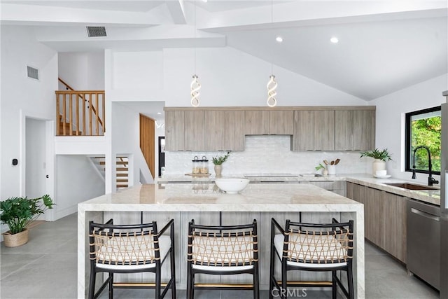 29951 Morongo Pl, Laguna Niguel, CA 92677 - kitchen with dishwasher, a sink, high vaulted ceiling, modern cabinets, and a kitchen bar