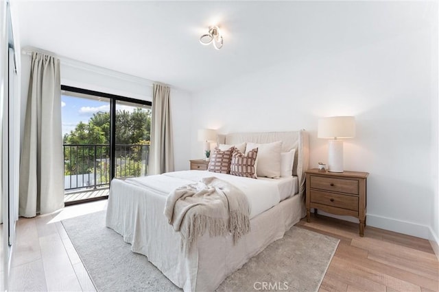 29951 Morongo Pl, Laguna Niguel, CA 92677 - bedroom with access to exterior, light wood-style flooring, and baseboards