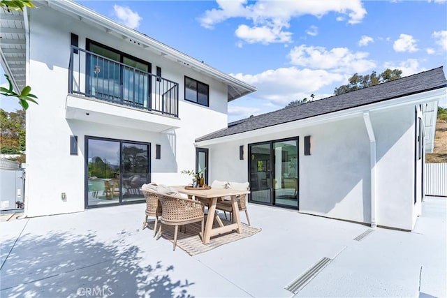 29951 Morongo Pl, Laguna Niguel, CA 92677 - rear view of house featuring stucco siding, a patio, a balcony, and outdoor dining space