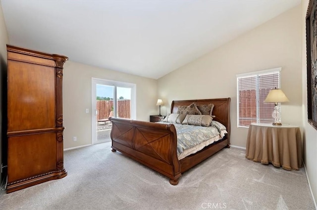 22523 White Sage St, Corona, CA 92883 - bedroom featuring access to outside, light carpet, vaulted ceiling, and baseboards