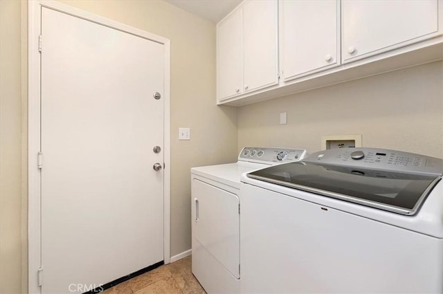 22523 White Sage St, Corona, CA 92883 - washroom with washer and dryer, cabinet space, and baseboards