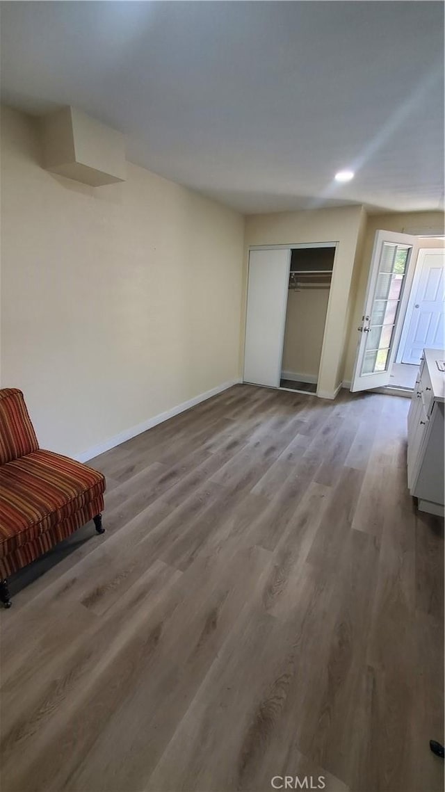 44709 6th St E, Lancaster, CA 93535 - unfurnished bedroom featuring baseboards, wood finished floors, a closet, and recessed lighting