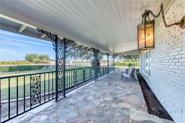 view of patio featuring a porch