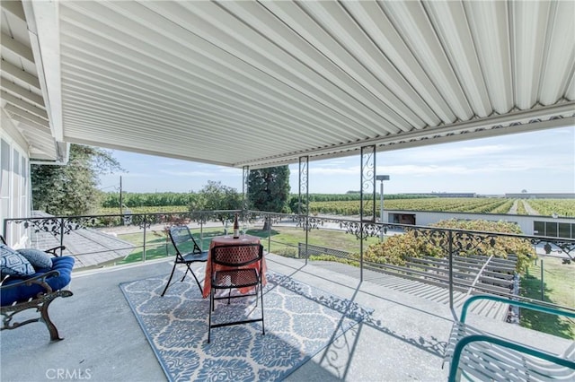 view of patio / terrace with a balcony