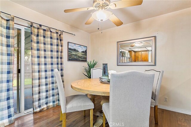 20672 Chaucer Ln, Huntington Beach, CA 92646 - dining room featuring wood finished floors, baseboards, and a ceiling fan