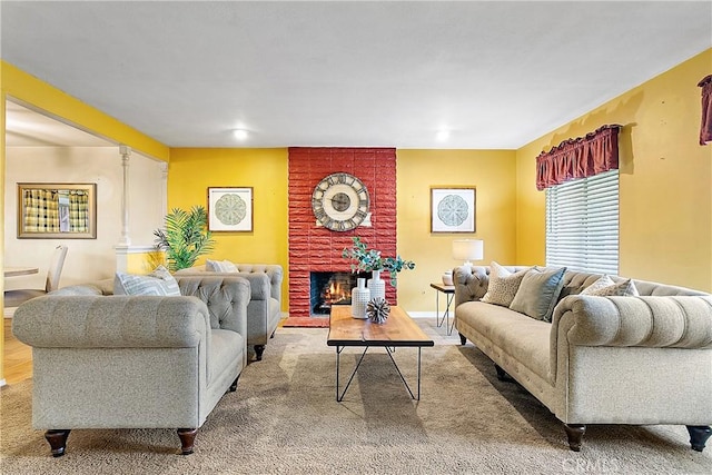 20672 Chaucer Ln, Huntington Beach, CA 92646 - carpeted living room featuring a brick fireplace