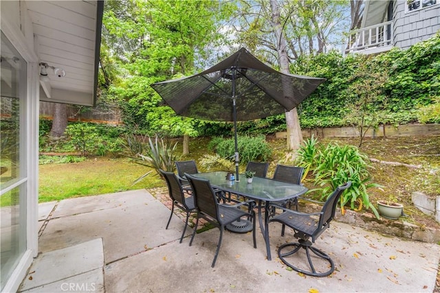 view of patio / terrace featuring outdoor dining area and a fenced backyard
