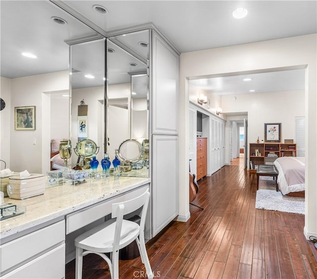 bathroom with hardwood / wood-style flooring