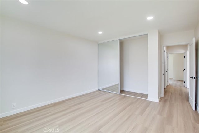 14704 Germain St, Mission Hills San Fernando, CA 91345 - unfurnished bedroom with light wood finished floors, recessed lighting, baseboards, and a closet