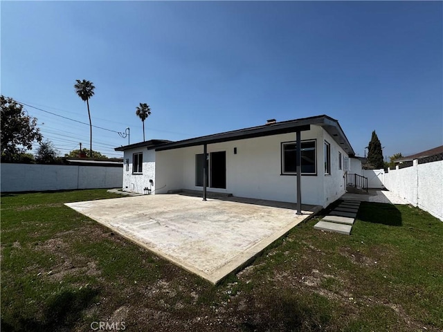 14704 Germain St, Mission Hills San Fernando, CA 91345 - back of house with a patio and stucco siding