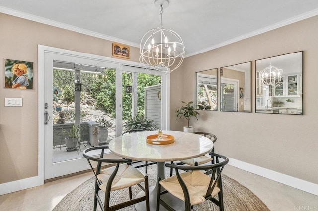 dining room with a chandelier, baseboards, plenty of natural light, and crown molding