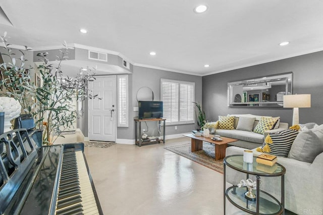 living room featuring finished concrete flooring, recessed lighting, baseboards, and ornamental molding
