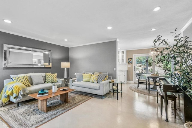 living room with recessed lighting, ornamental molding, concrete floors, and baseboards
