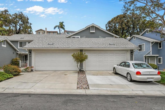 view of front of home featuring driveway and a garage