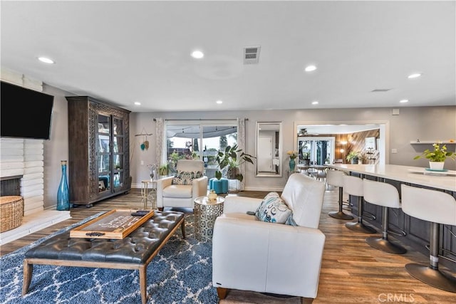 340 Terry Way, La Habra, CA 90631 - living room featuring wood finished floors, a fireplace, recessed lighting, and baseboards