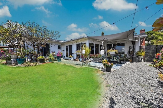 340 Terry Way, La Habra, CA 90631 - back of house featuring a patio area and a chimney