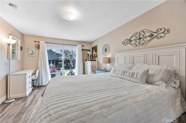 340 Terry Way, La Habra, CA 90631 - bedroom with light wood-type flooring, access to outside, and baseboards