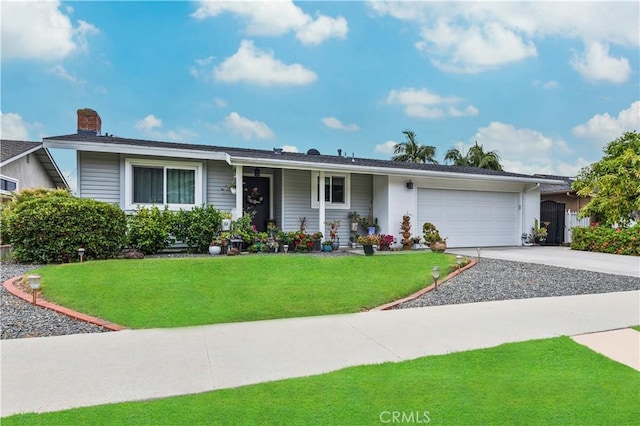 340 Terry Way, La Habra, CA 90631 - single story home with driveway, a garage, a front yard, and a chimney