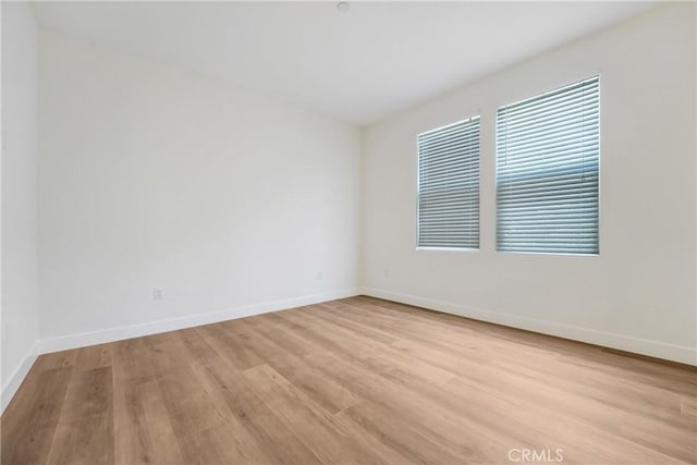 281 N Mar Vista Ave Unit 23, Pasadena, CA 91106 - spare room with light wood-style flooring and baseboards