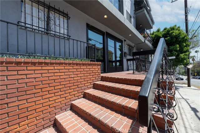view of patio / terrace featuring stairs