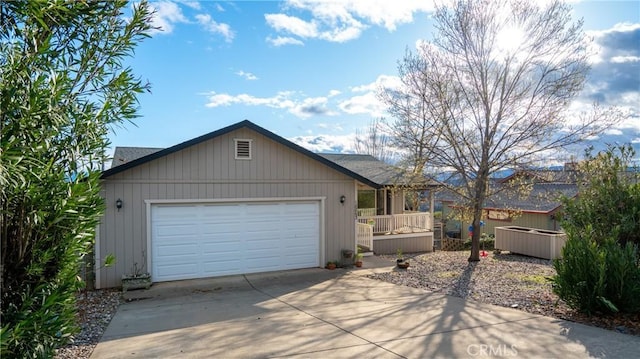 18863 Stonegate Rd, Hidden Valley Lake, CA 95467 - view of front facade with concrete driveway and an attached garage