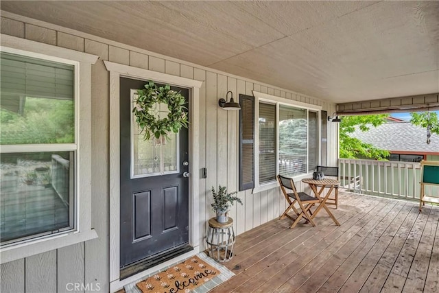 18863 Stonegate Rd, Hidden Valley Lake, CA 95467 - entrance to property featuring a porch and board and batten siding